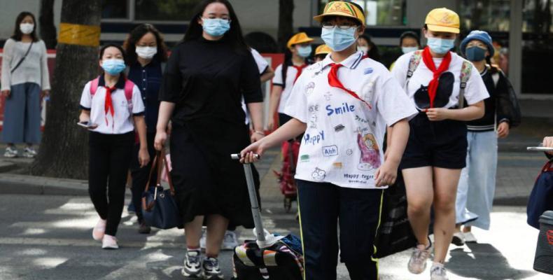 Varios estudiantes van a sus clases en China pese al coronavirus / -/TPG via ZUMA Press/dpa (Xinhua/EP)