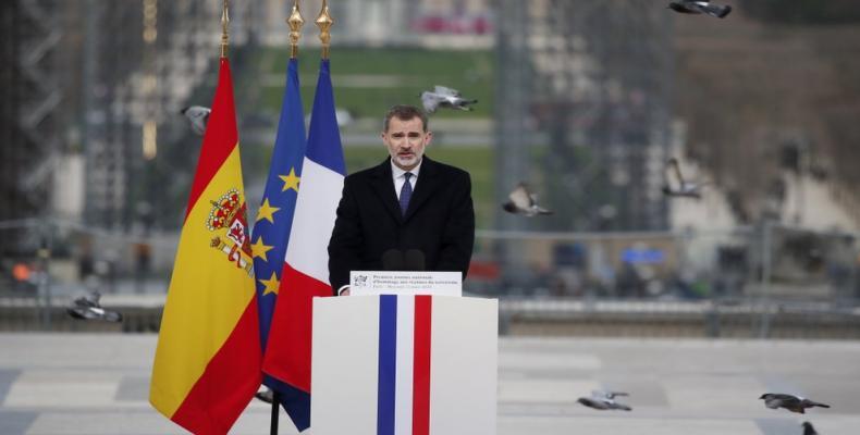 Spain's King Felipe VI delivers his speech during a ceremony to honor victims of terror attacks in Europe, on the 16th anniversary of Madrid attacks, at the Tro