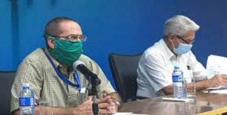 Dr. Ricardo Pereda and Dr. Francisco Duran, Cuban Ministry of Public Health.