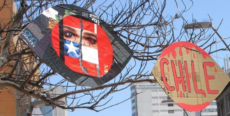 Eye-shaped protest art in Antofagasta to protest injuries caused by police projectiles.  (Photo: Sandra Cuffe/Al Jazeera)