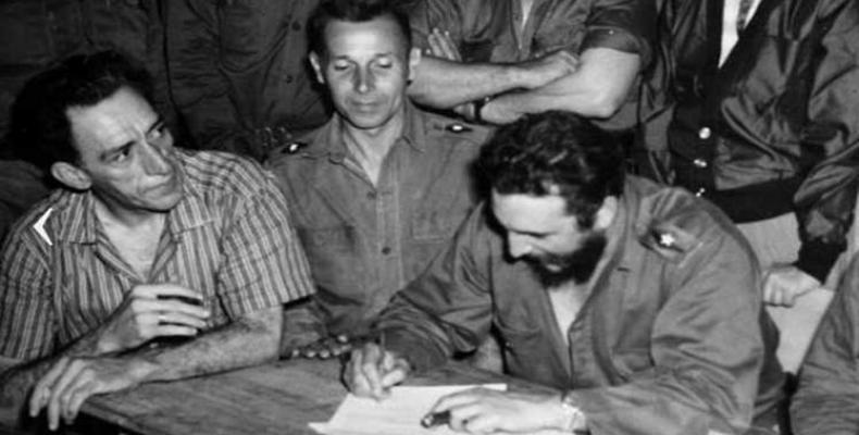 Fidel Castro signs first Agrarian Reform Law on May 17, 1959.