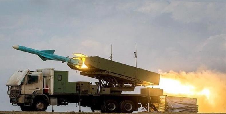 The Iranian Navy launches a long-range shore-to-sea missile in a military exercise in the country’s southern waters.  (Photo: Tasnim)