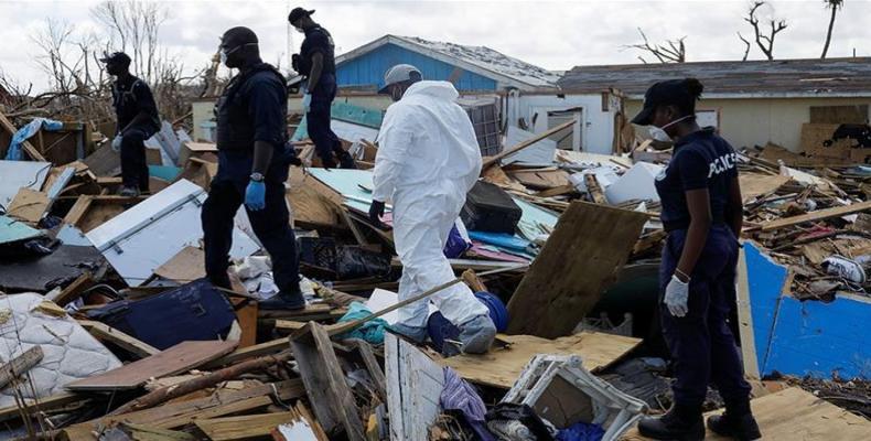 Search for dead in the destroyed Marsh Harbour, Bahamas.  (Photo: Marco Bello/Reuters)