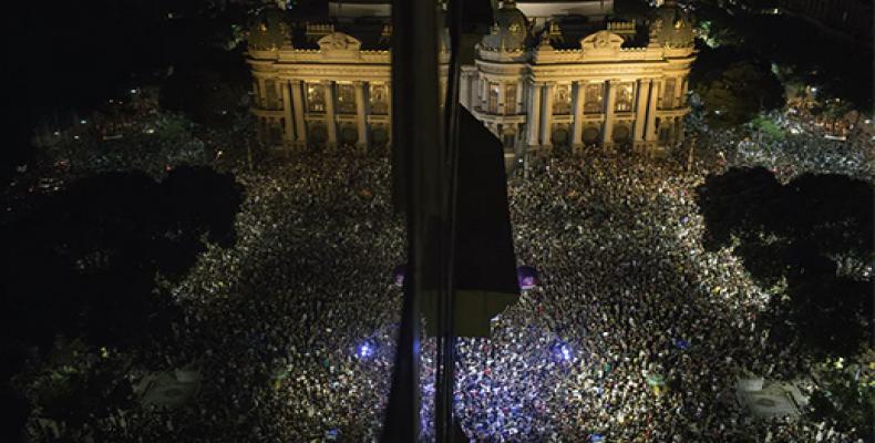 Thousands gather in front the Municipal Theater in downtown Rio de Janeiro, during a protest against the death of Marielle Franco. Photograph: Leo Correa/AP