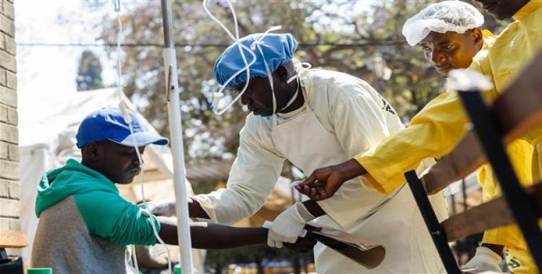 Patients await treatment at a makeshift cholera clinic in Harare, Zimbabwe, September 11, 2018.   Photo: Reuters