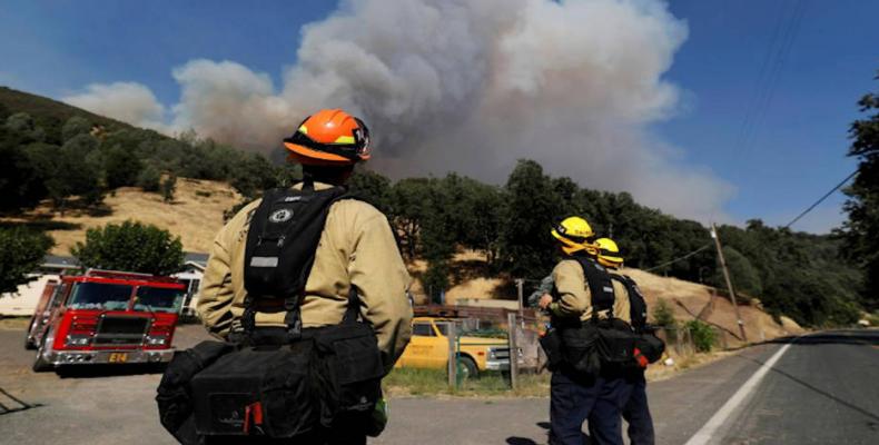 At least 30 killed and 200 missing in California wildfires.  Photo: AFP