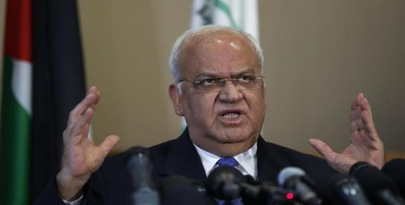 Palestine Liberation Organization Secretary General Saeb Erekat speaks to journalists during a press conference in the occupied West Bank city of Ramallah on Se