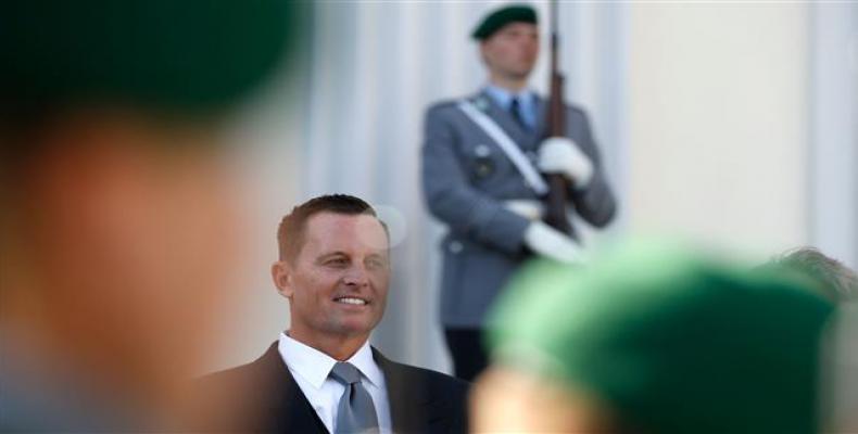 Newly accredited US Ambassador Richard Allen Grenell stands in front of a military honor guard during an accreditation ceremony for new Ambassadors in Berlin, G