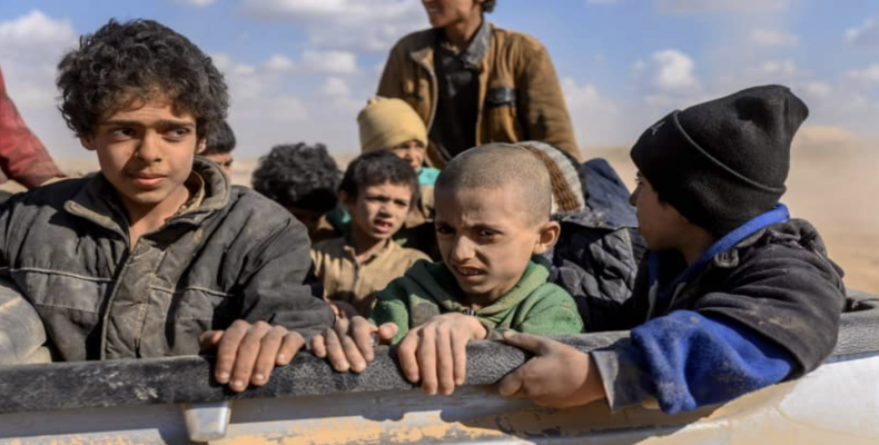 Children believed to be from the Yazidi community, who had been captured by Islamic State group fighters, are pictured after being evacuated from the group's e
