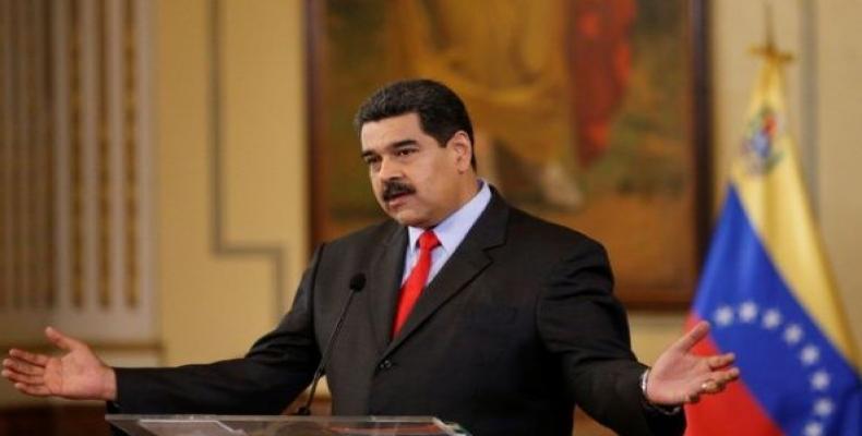 Venezuela's President Nicolas Maduro gestures as he talks to the media during a news conference in Caracas, Venezuela February 15, 2018.  Photo: Reuters