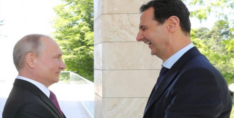 Presidente ruso, Vladimir Putin, y su similar sirio, Bashar Al Assad