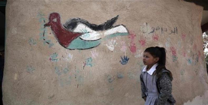 A Palestinian girl walks at her school in the village of Khan al-Ahmar in the Israeli-occupied West Bank on February 23, 2017.  Photo: AFP