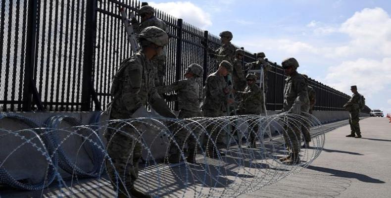Army engineers installing concertina wire on border with Mexico at McAllen, Texas.  (Photo: US Air Force/Handout via Reuters)