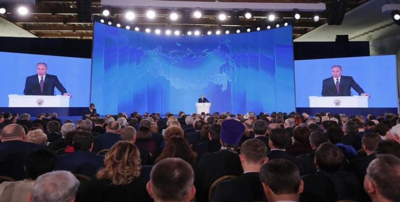 Putin during his annual address to the joint session of the bicameral Federal Assembly. Maxim Shemetov / Reuters