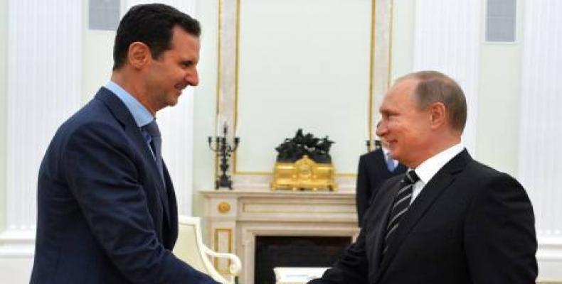 Presidentes de Siria, Bashar Al Assad, y de Rusia, Vladimir Putin