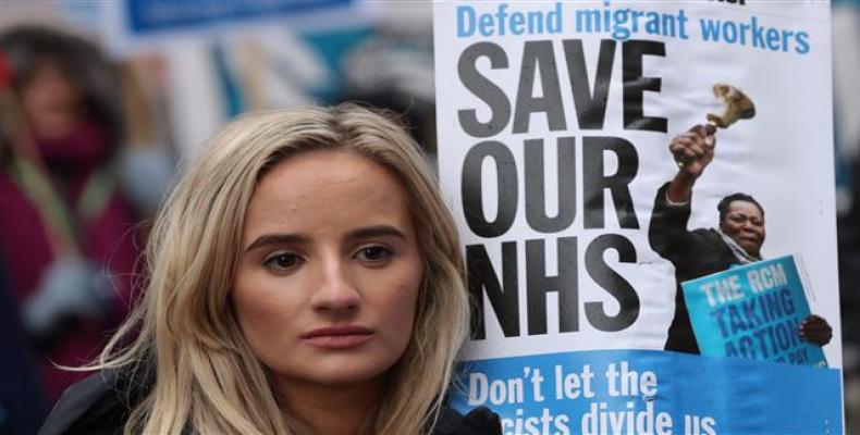 A protester in central London, February 3, 2018 (Photo by AFP)