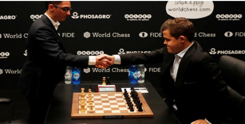 Caruana-Carlsen. Foto: Reuters