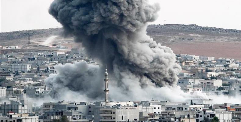 In this file photo, heavy smoke rises from Kobani, Syria, following an airstrike by the US-led coalition there.  Photo: Getty Images