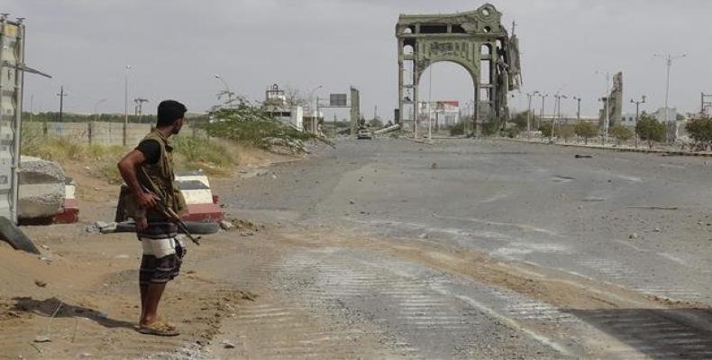 A pro-Saudi militant stands at the eastern entrance to Hudaydah, Yemen.  Photo: AFP