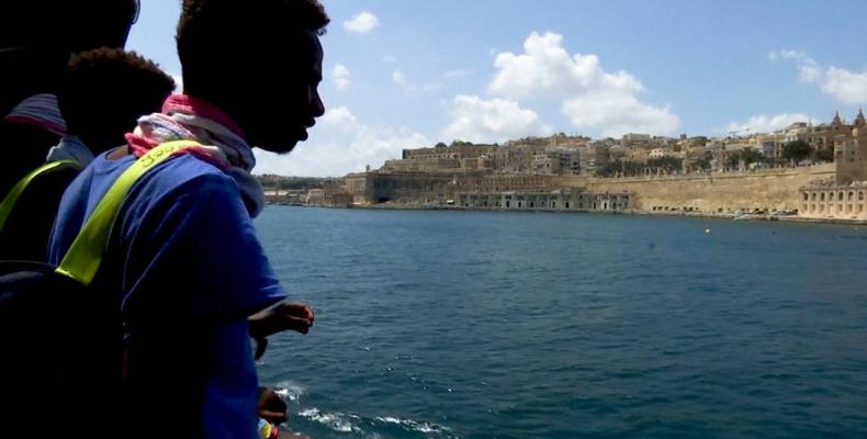 Malta allows migrant ship to dock after five days stranded at sea.  Photo: Democracy Now