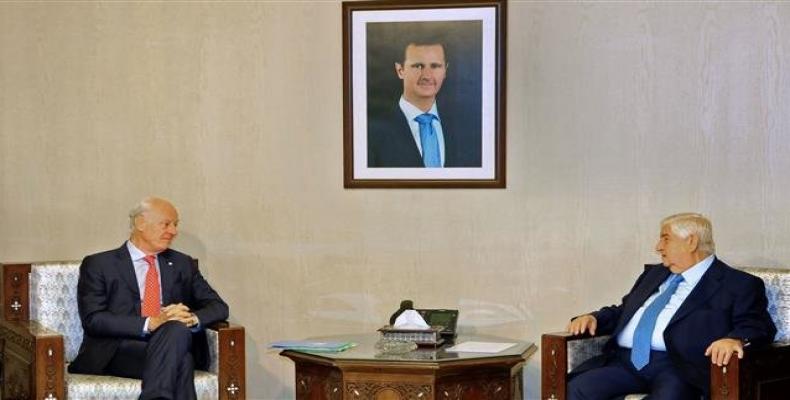 A handout picture released by the official Syrian Arab News Agency (SANA) on October 24, 2018, shows Syrian Minister of Foreign Affairs and Expatriates Walid al
