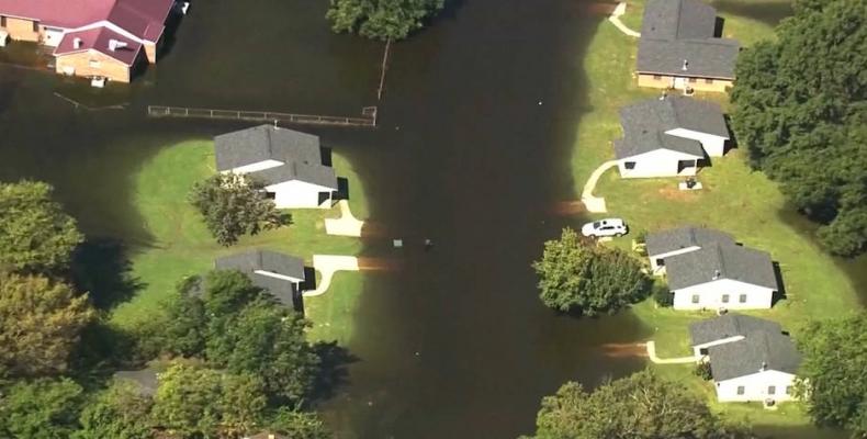 Study shows 11,000 more homes in Carolinas were damaged in storm due to rising sea levels.  Photo: AFP