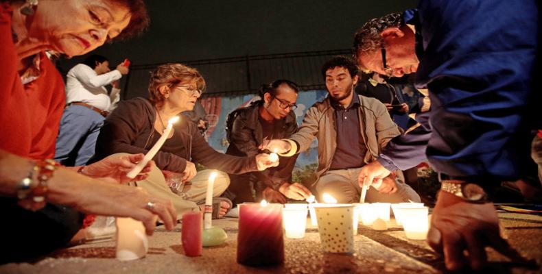 Activistas encienden velas en memoria de Sergio Rojas en Costa Rica. 19 de marzo 2019. Juan Carlos Ulate / Reuters