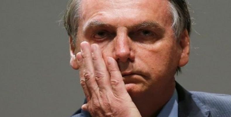 President Jair Bolsonaro attends the 3rd National Control Forum seminar in Brasilia, November 28. (Photo: Reuters)