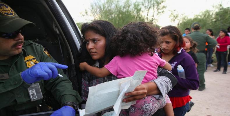 U.S. policy of separating young children from mothers is criminal.  Photo: AFP