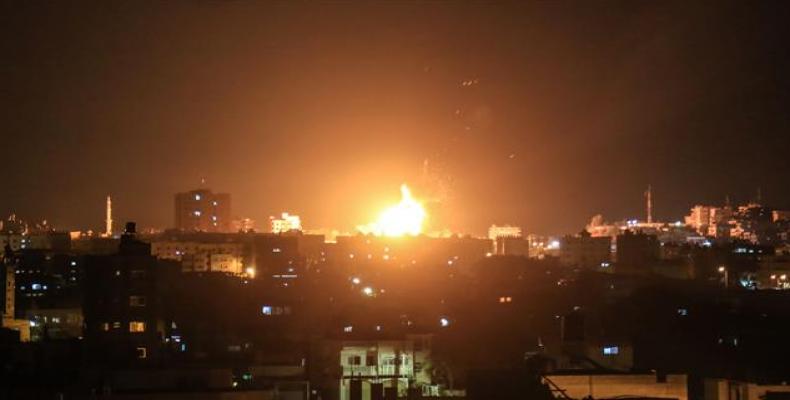 An explosion is seen in northern Gaza City after an airstrike carried out by an Israeli warplane on June 20, 2018.  Photo: AFP