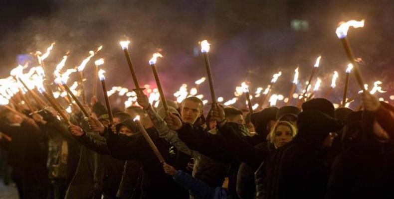 Members of nationalist organizations march with torches during a march to commemorate to commemorate Bulgarian General and politician Hristo Lukov, in the centr