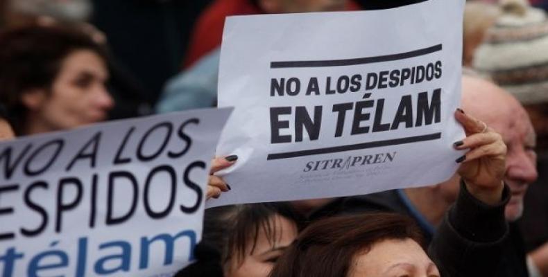 Demonstrators attend a protest against the President Macri's government agreement with the IMF in Buenos Aires, Argentina, July 9, 2018. The sign reads: &quot;N