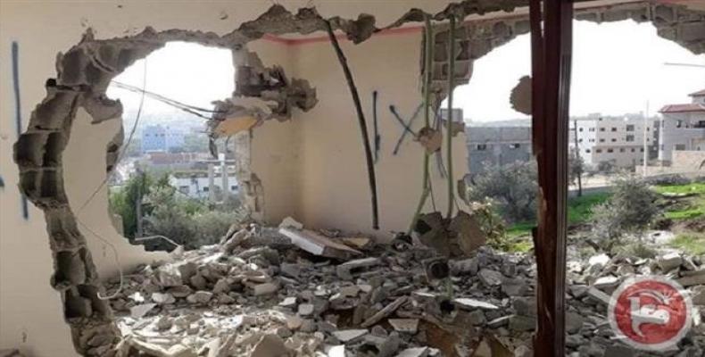 The photo, taken on December 16, 2018, shows the aftermath of demolition of Palestinian Ashraf Na’alwa’s family home by Israeli forces in the Shweika village, i