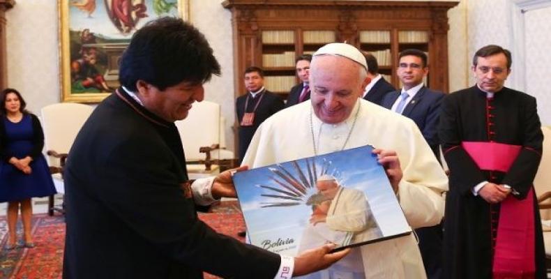 Evo Morales gave Pope Francis an image of him embracing a Bolivian child.   Photo: Reuters