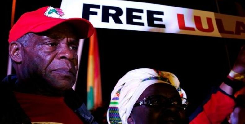 U.S. actor Danny Glover attends a demonstration in support of former Brazilian President Luiz Inacio Lula da Silva at a camp near the Federal Police headquarter