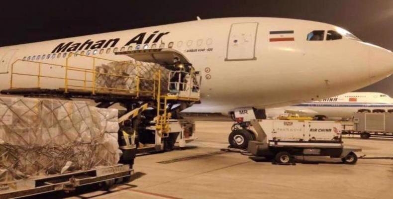 File photo shows Iran’s Mahan Air airlines transporting supplies. (Photo via IRNA)