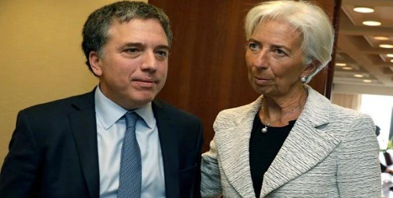 International Monetary Fund greets Argentina's Treasury Minister Nicolas Dujovne ahead of their meeting at the IMF on a new loan request in Washington.  Photo: