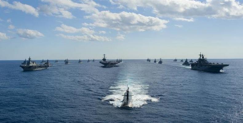 A formation of ships from the US Navy and Japan Maritime Self-Defense Force cruise in the Pacific Ocean at the conclusion of exercise Keen Sword, which took pla