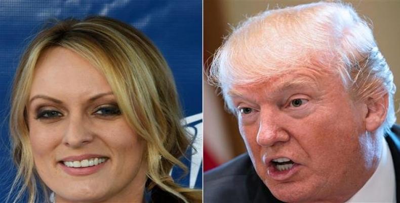 This combination of file pictures shows adult film actress Stormy Daniels and U.S. President Donald Trump.  Photo: Press TV