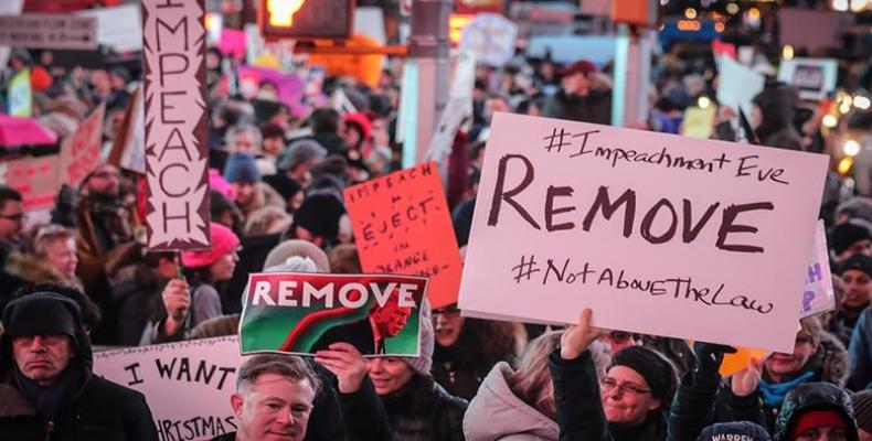 Anti-Trump protesters rally in New York City to call for his impeachment. (Photo: Bebeto Matthews/AP)