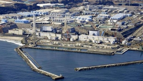 Japan approves plan to discharge radioactive water into ocean