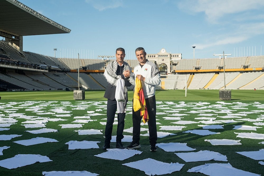 400 white t-shirts laid out in memory of those killed in Gaza